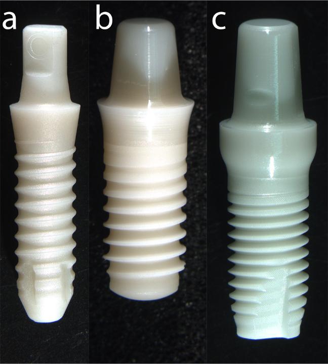 Fig 7: Three different one-piece implants: a) Axis Monobloc (Axis Biodental, CH), b) PURE Ceramic (Straumann, CH) and c) Zirkolith Z5m (Z-Systems, CH)